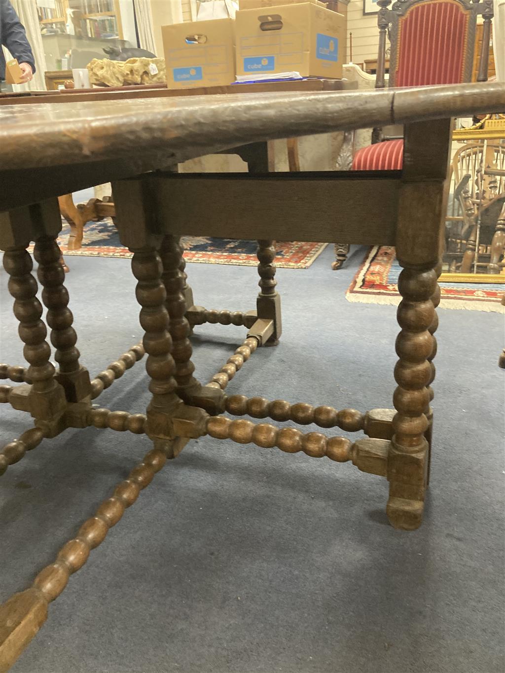 An 18th century and later oak bobbin leg gateleg dining table, length 170cm extended, width 162cm, height 76cm